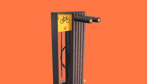 Bike station Frame da Floema Urban, equipamento urbano para a mobilidade suave com estrutura em plástico reciclado castanho, aço metalizado e pintado e HPL+.
